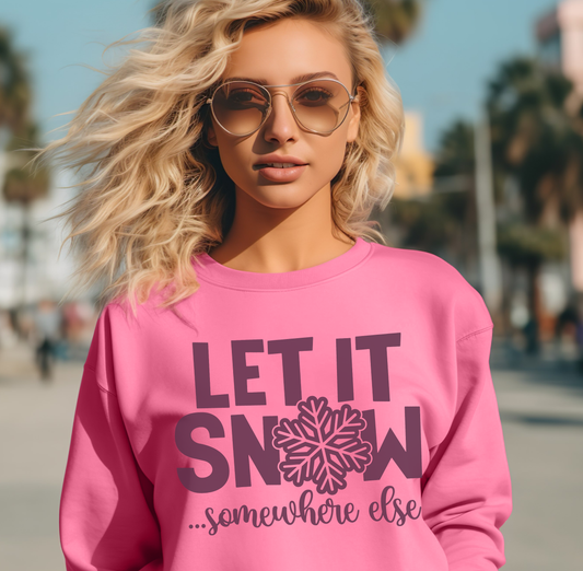 Woman wearing a green hoodie with text in an outdoor setting